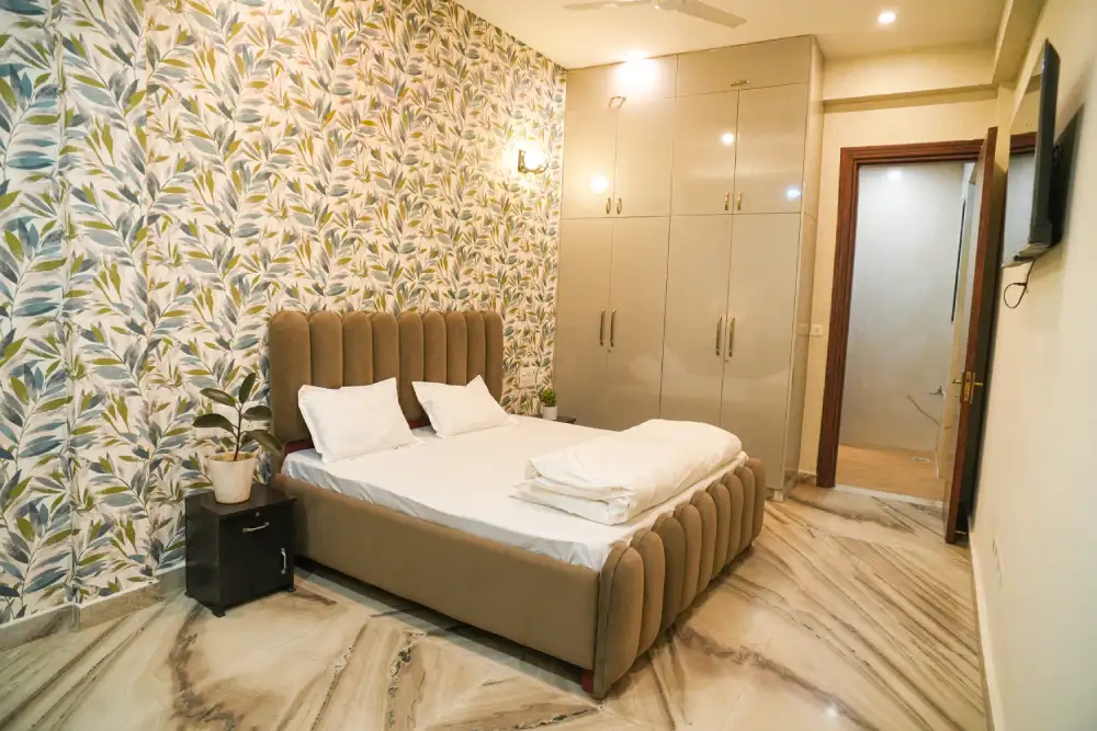 Bedroom with a single bed and wardrobe at Panaah Rehabilitation Centre